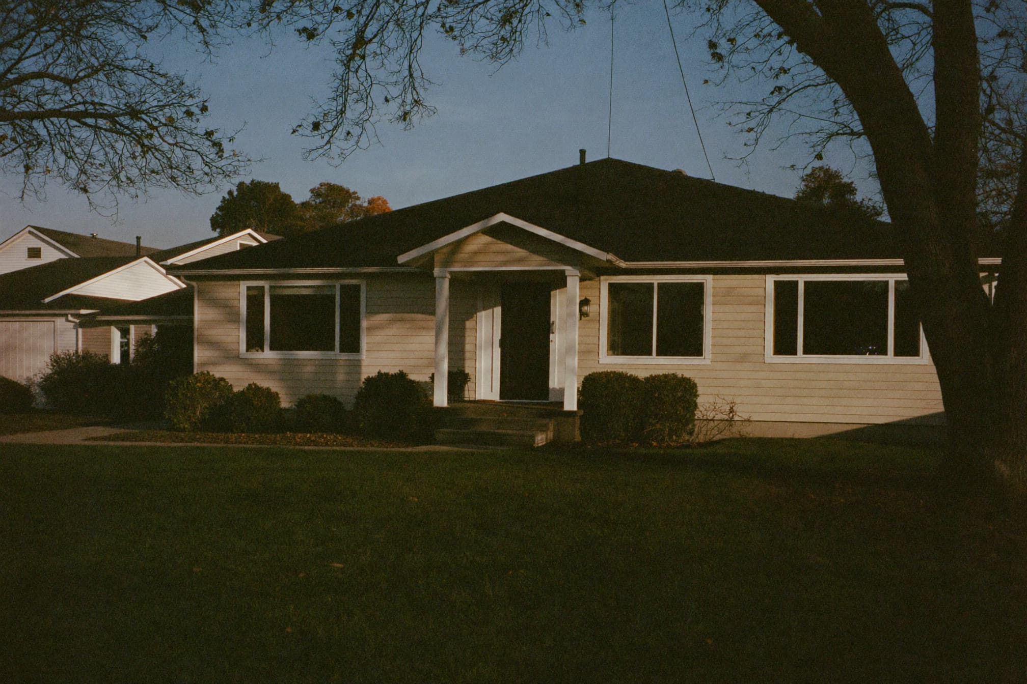 Suburban single-family home in late afternoon light